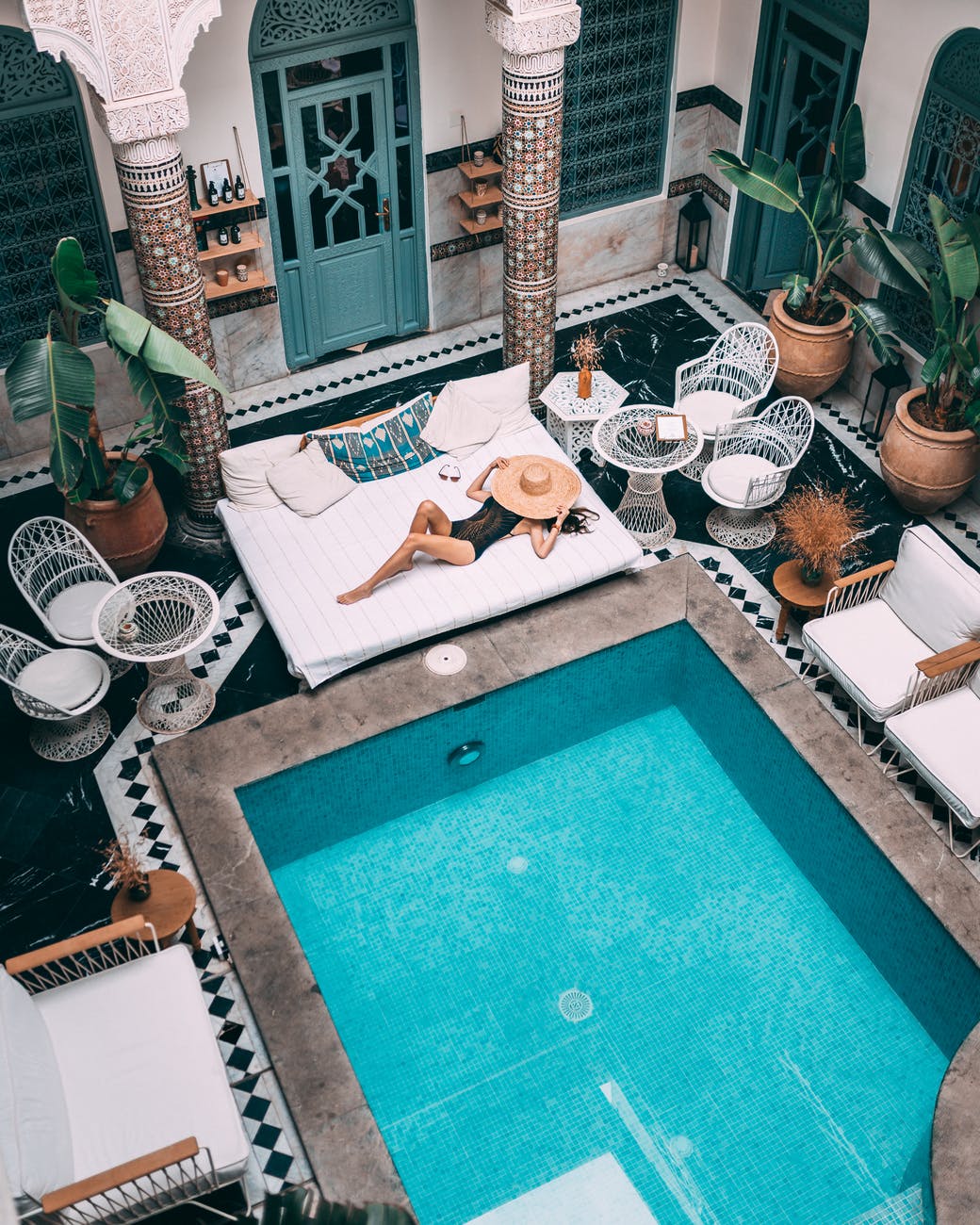 woman relaxing by pool