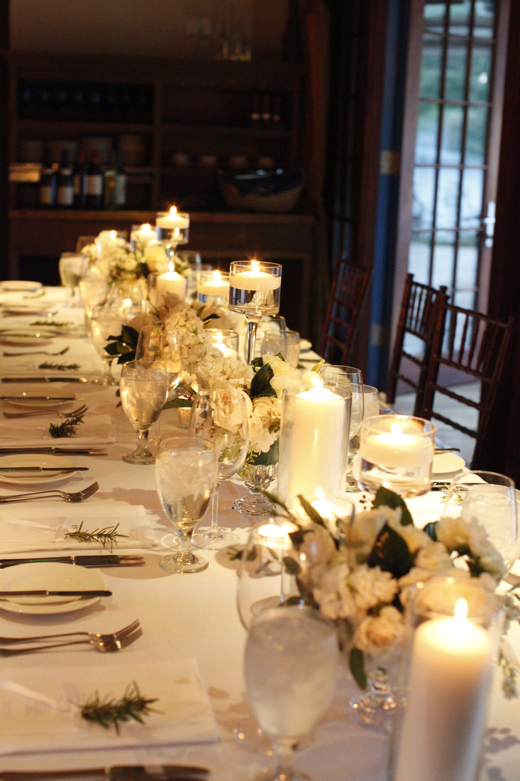 long table with flowers and candles