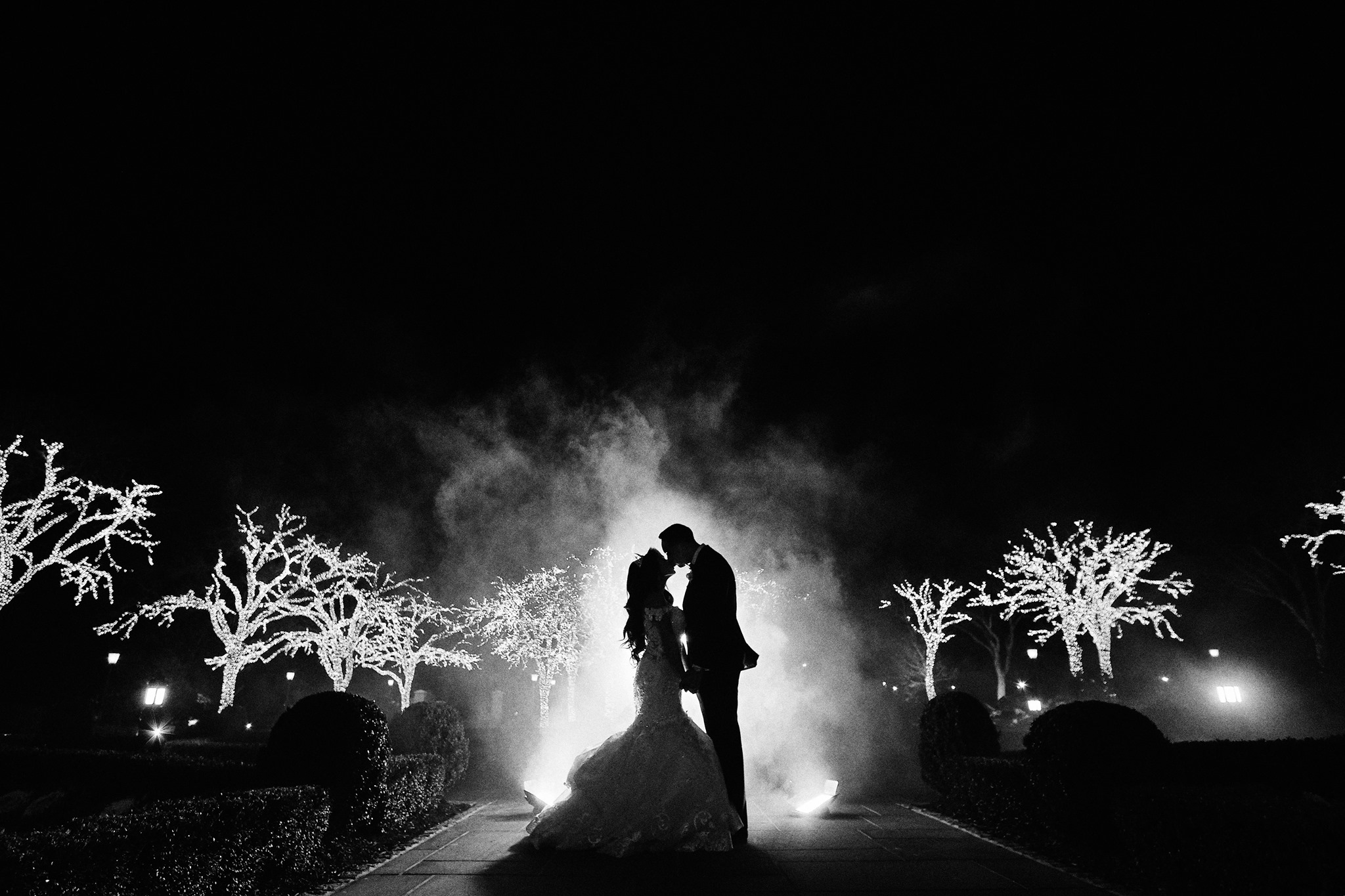 bride and groom in black and white outdoor wedding