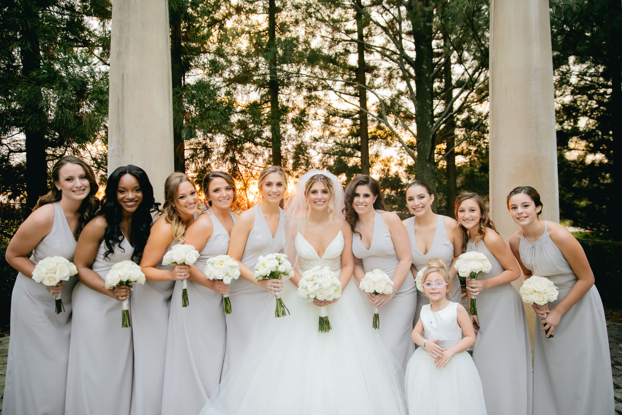 bride with her bridesmaids in gray