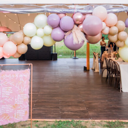 balloon arch outside wedding tent