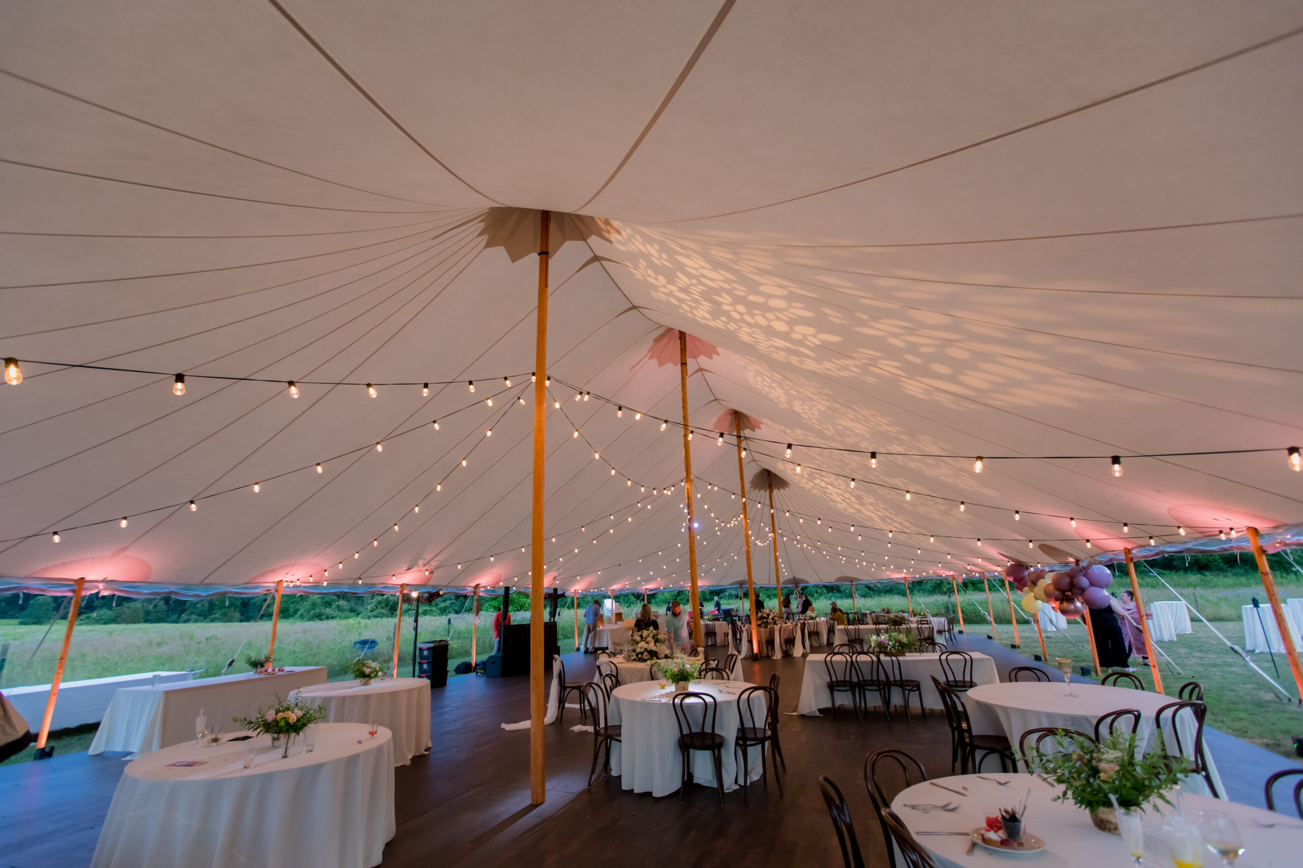 tented wedding with lighting