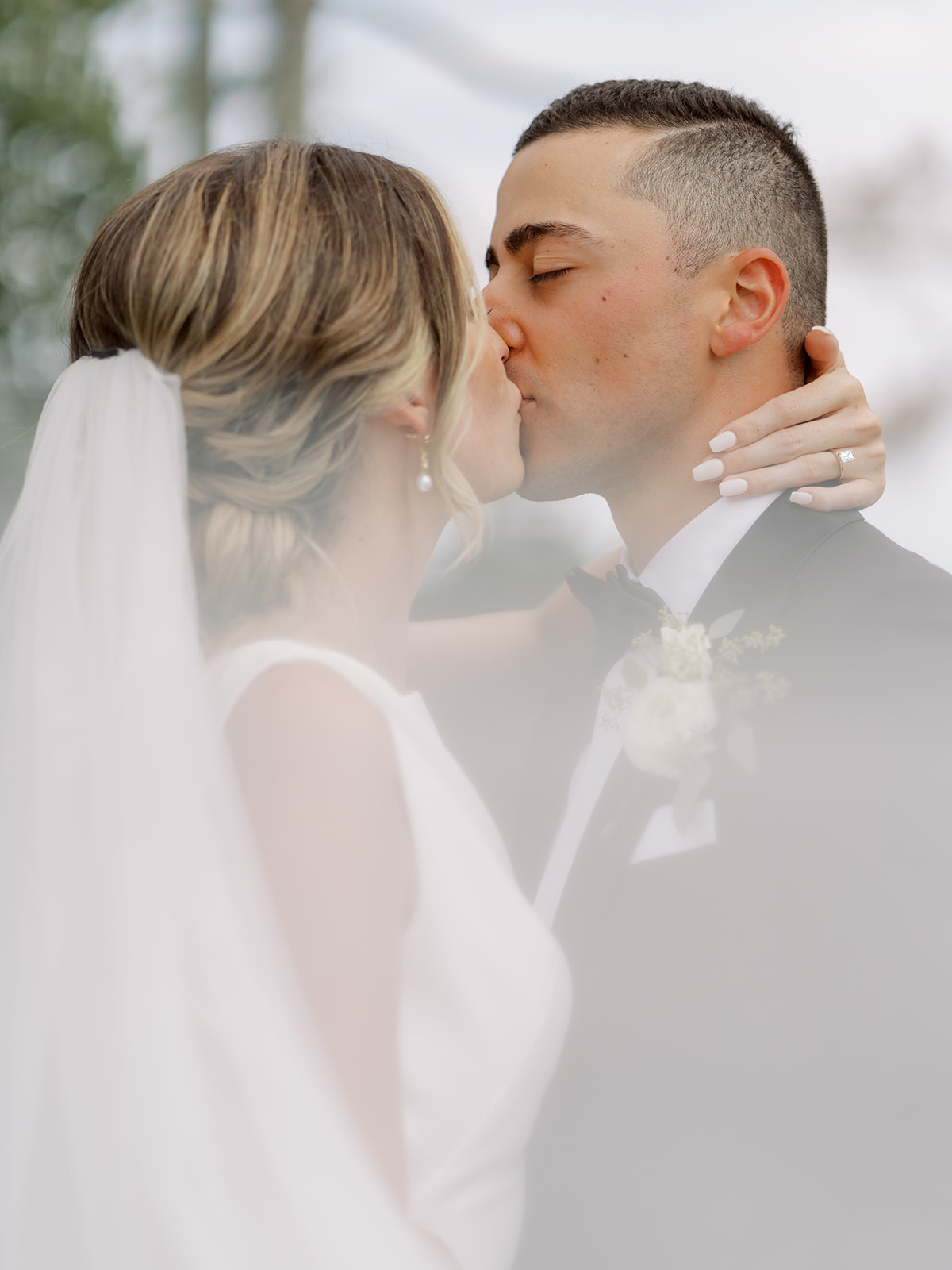 bride and groom kissing