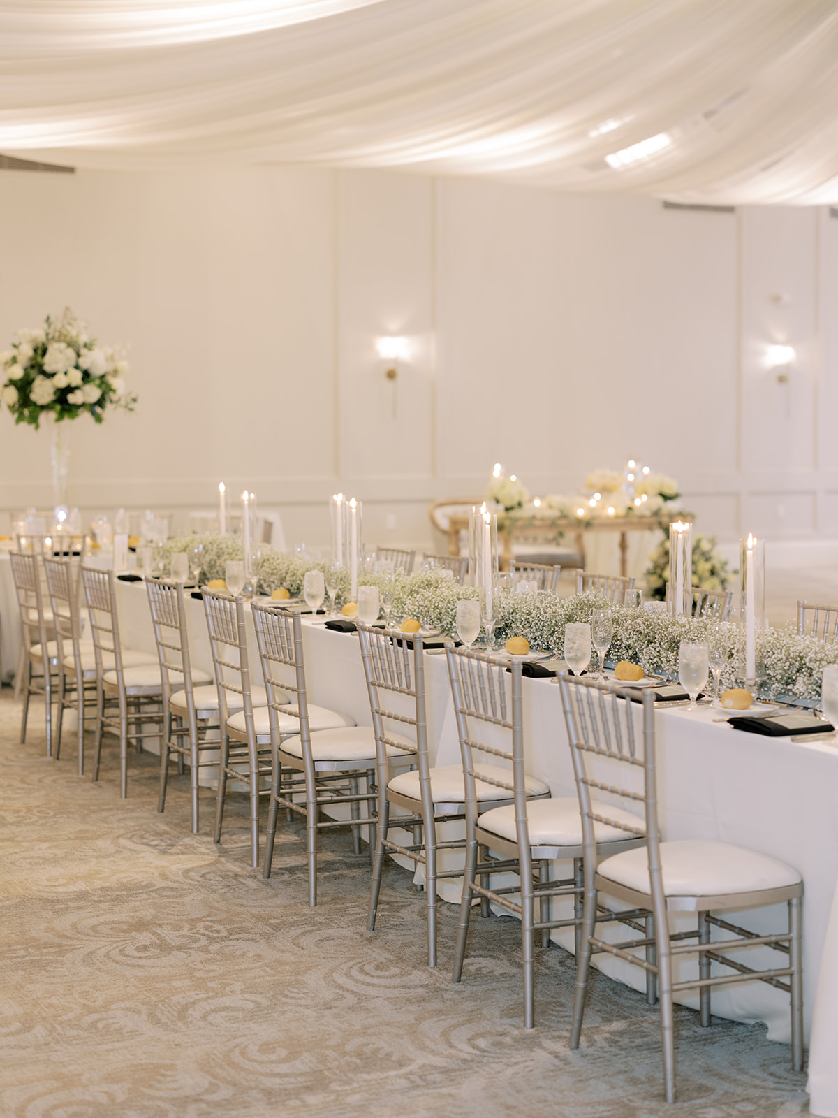 long table with babys breath and candles