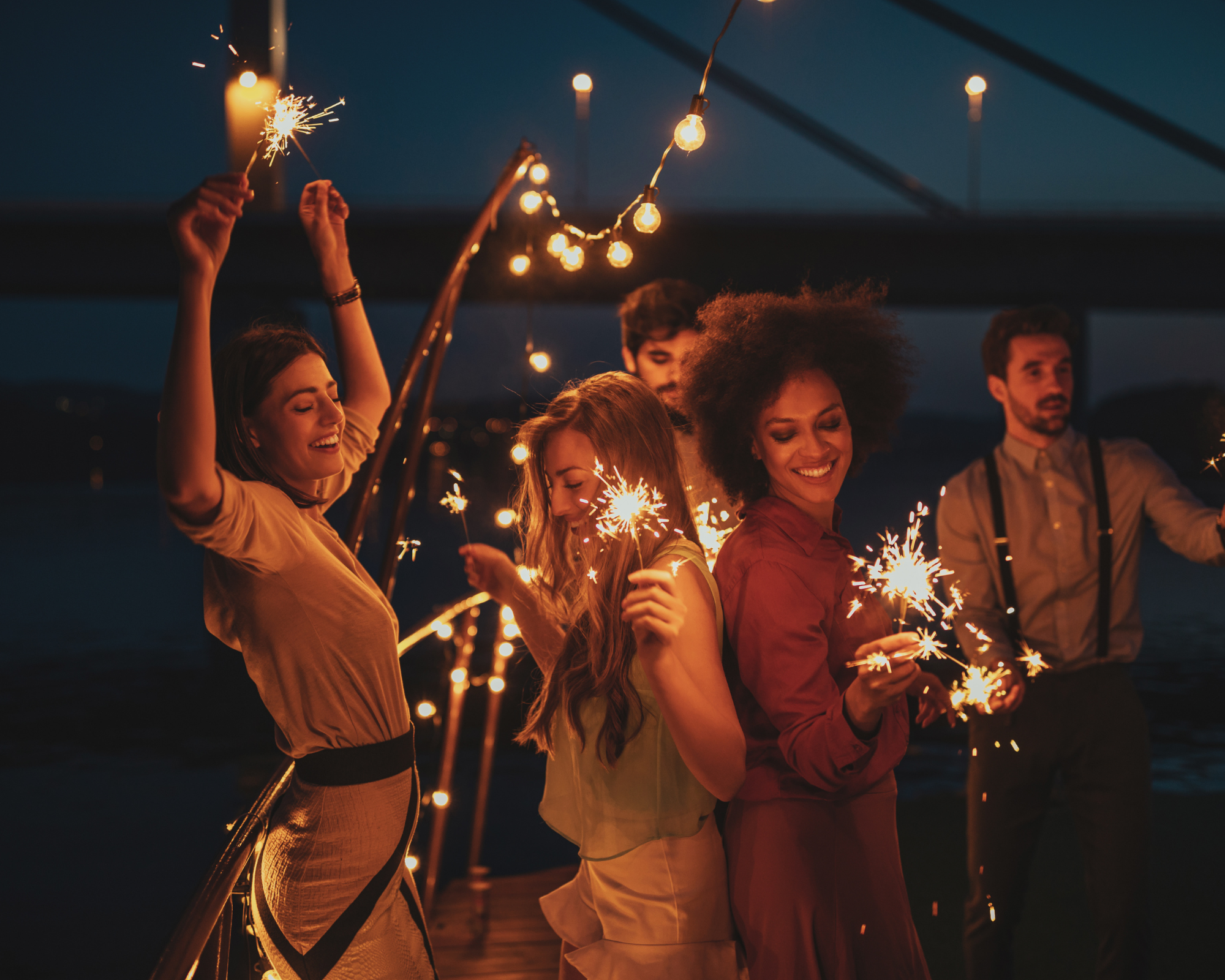 group of friends with sparklers
