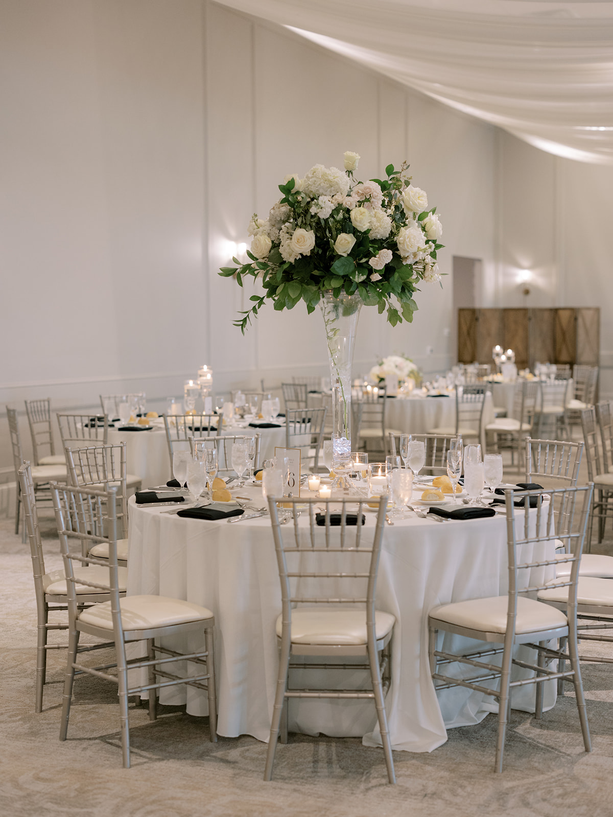 tall white and green centerpiece