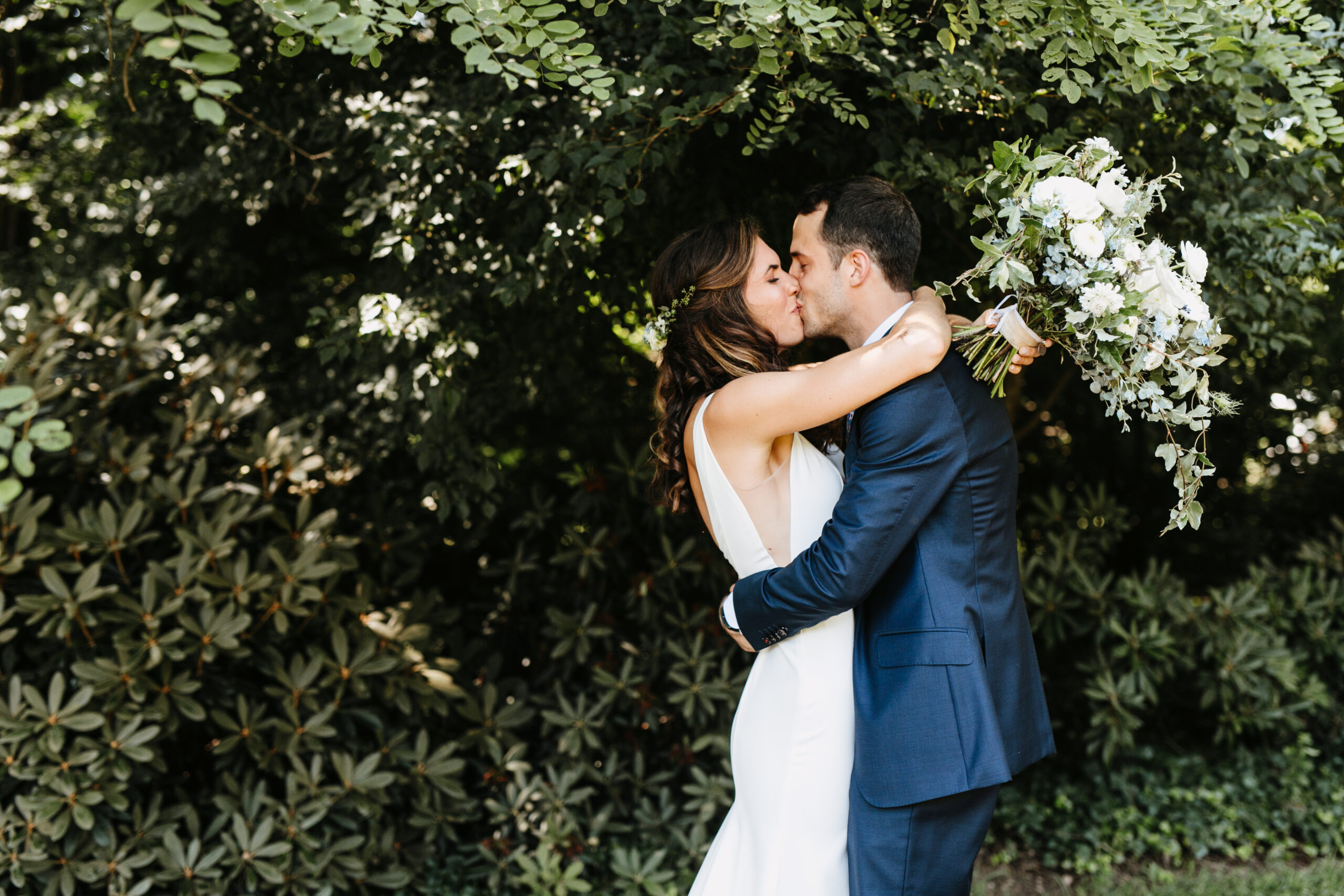 first look wedding photo with bride and groom