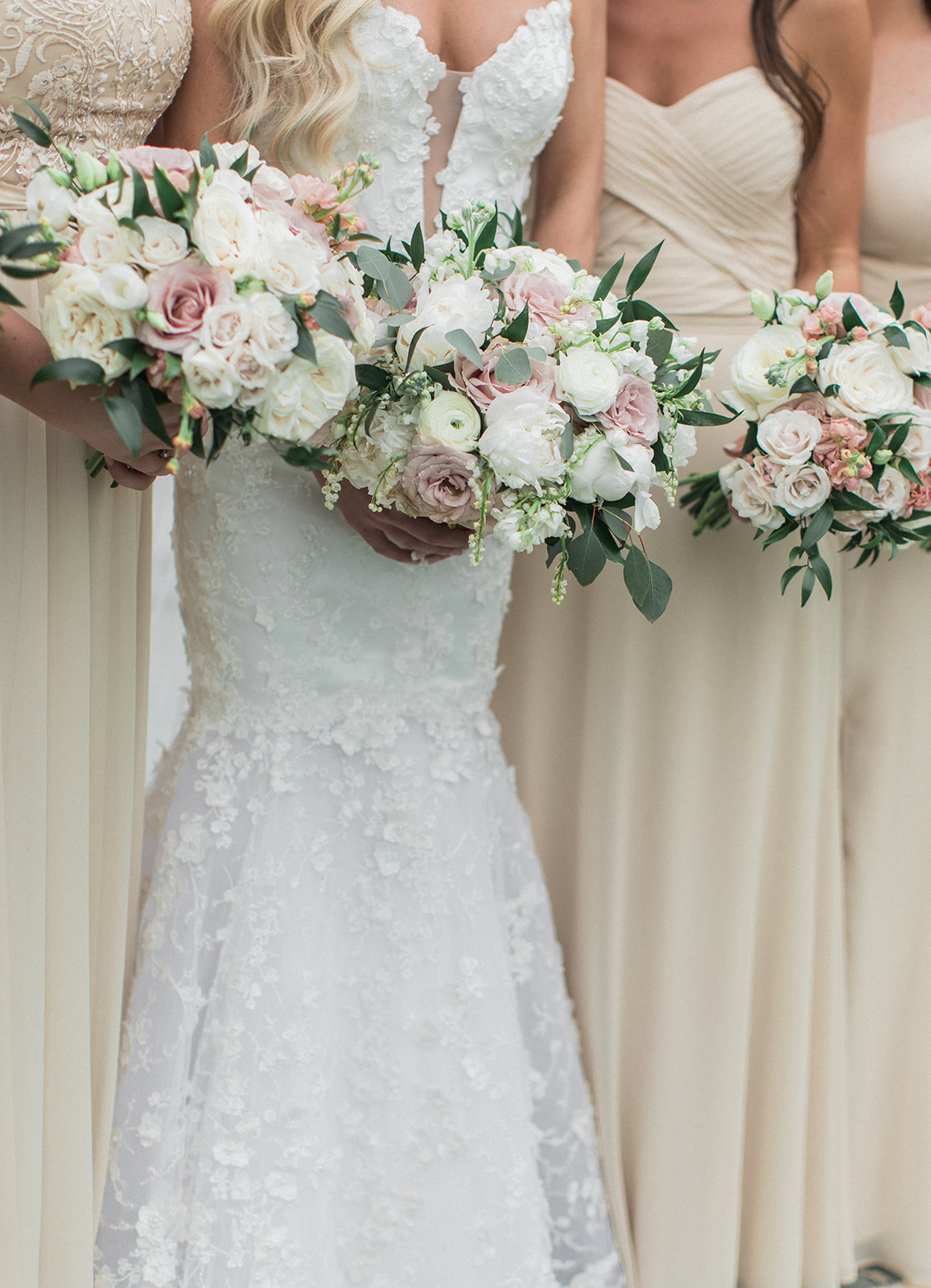 bride and bridesmaids with bouquets