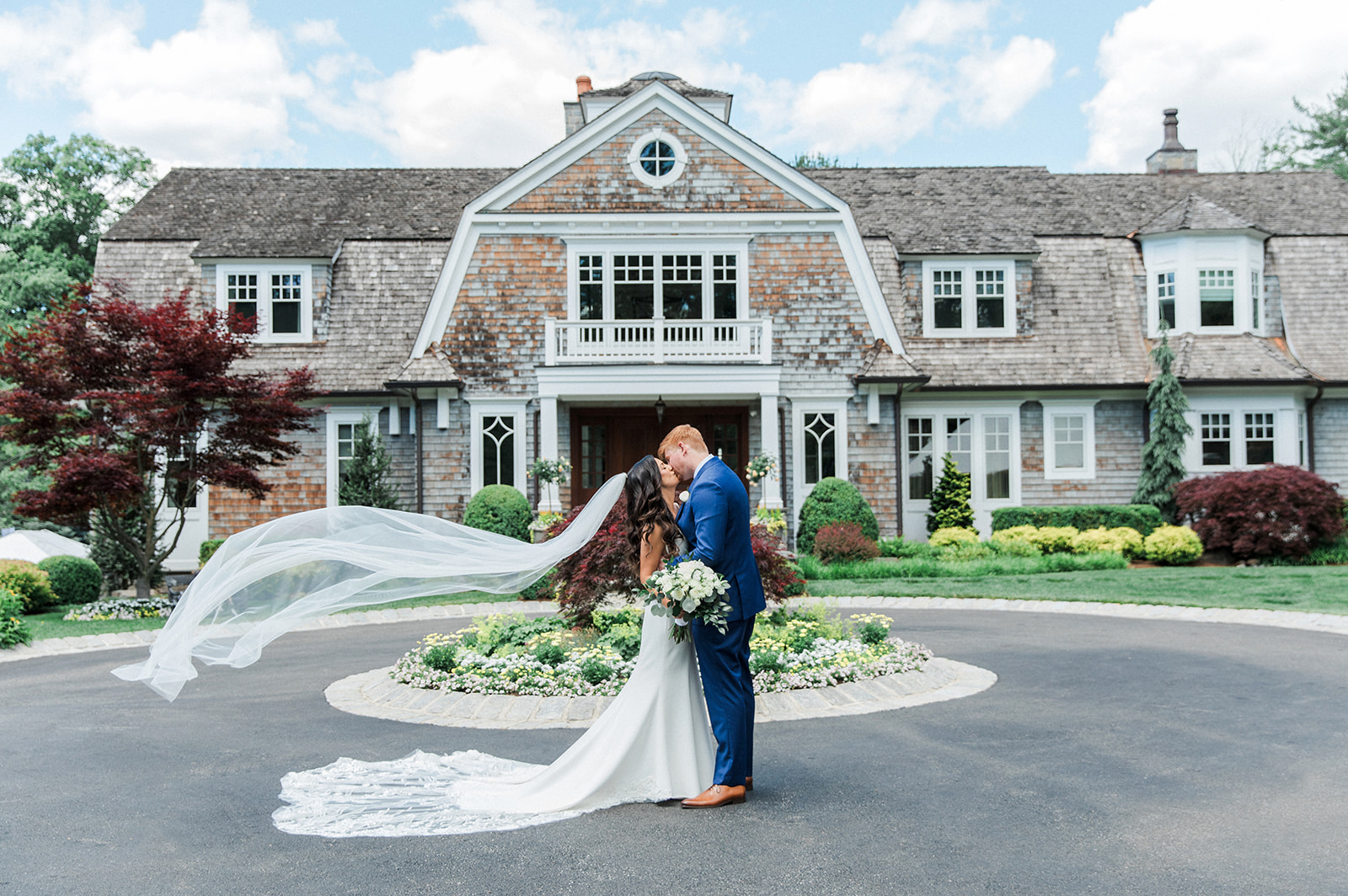 bride and groom kissing