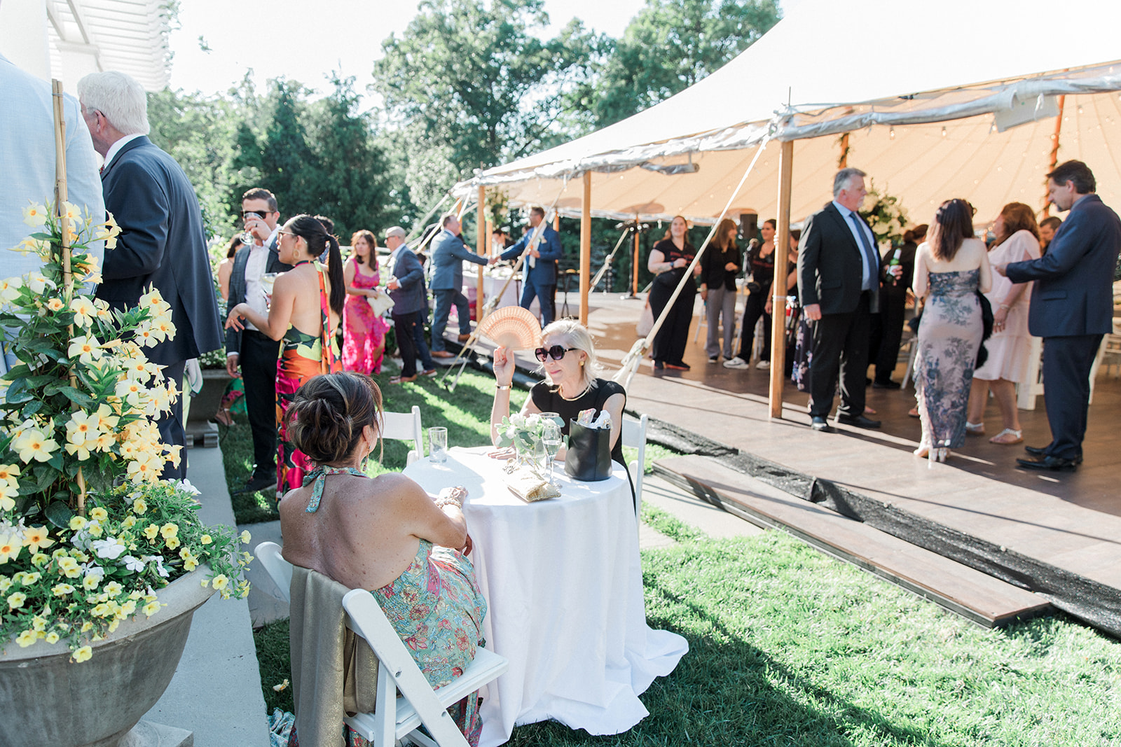 backyard wedding tent with guests