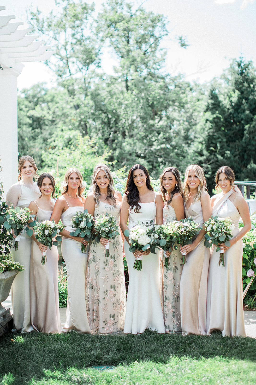 bride with bridesmaids and bouquets