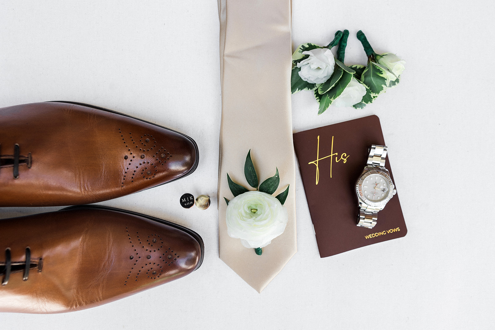 details for a wedding including groom shoes tie and bout