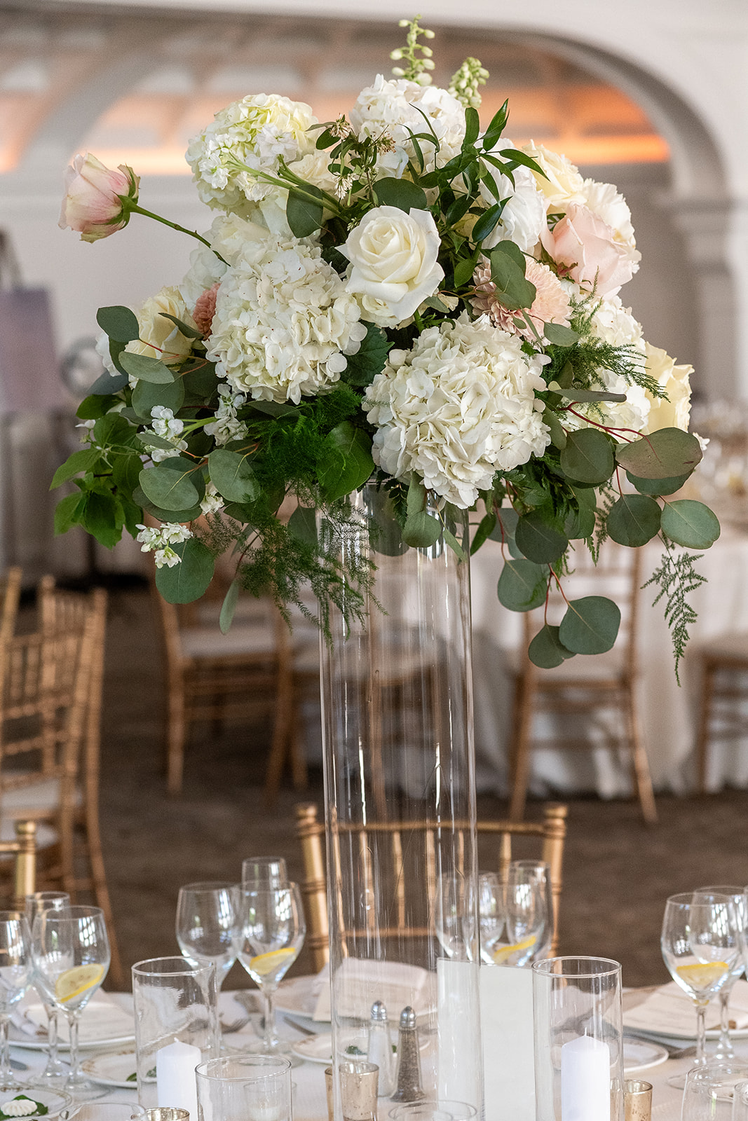 tall centerpiece green white and pink