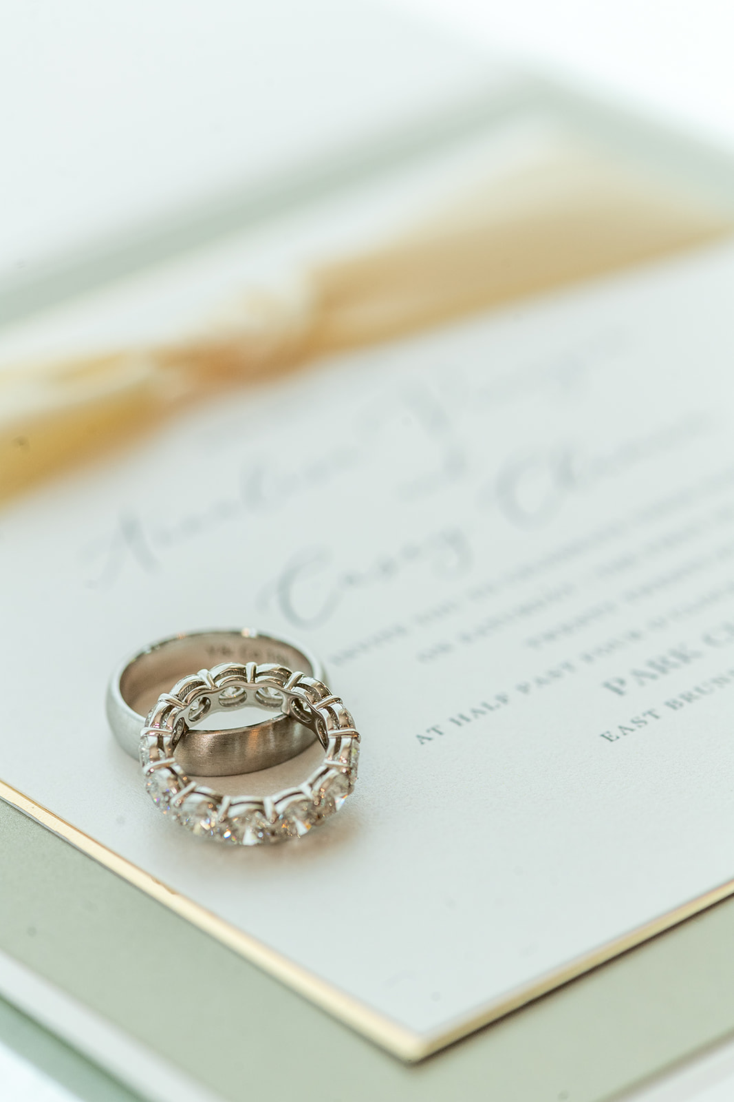 wedding bands and wedding invitation