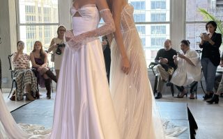 two models wearing high end wedding gowns