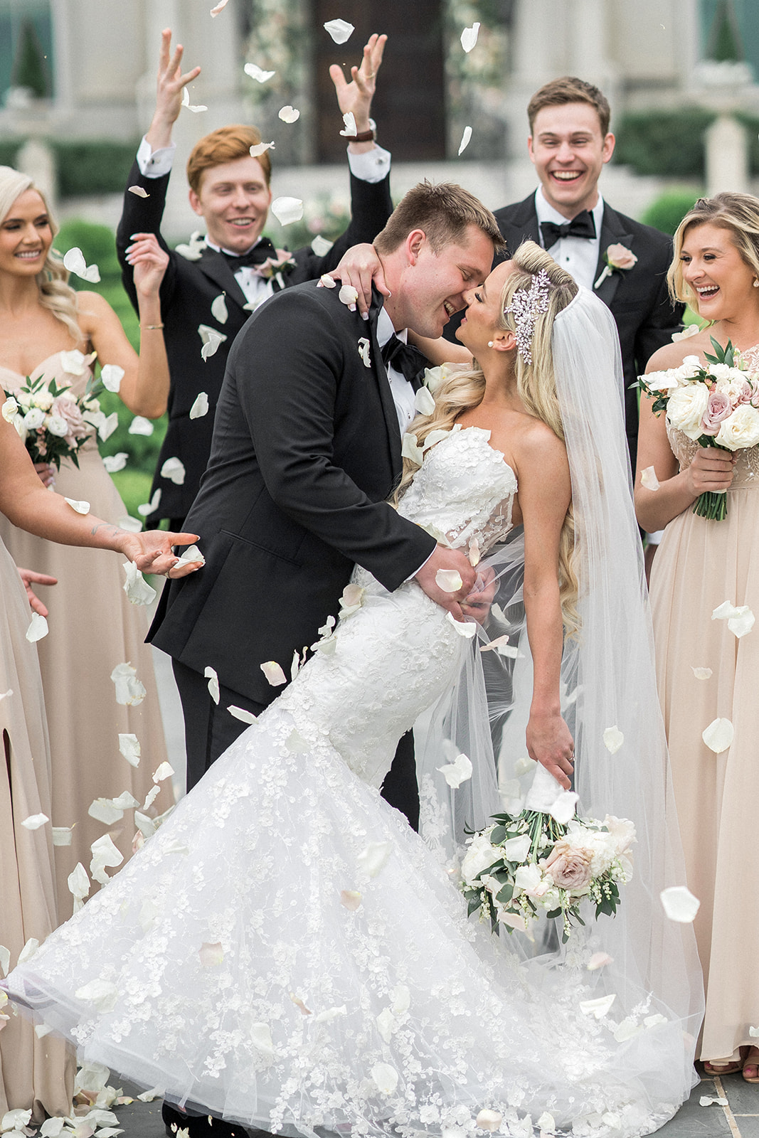 bride and groom with petal toss