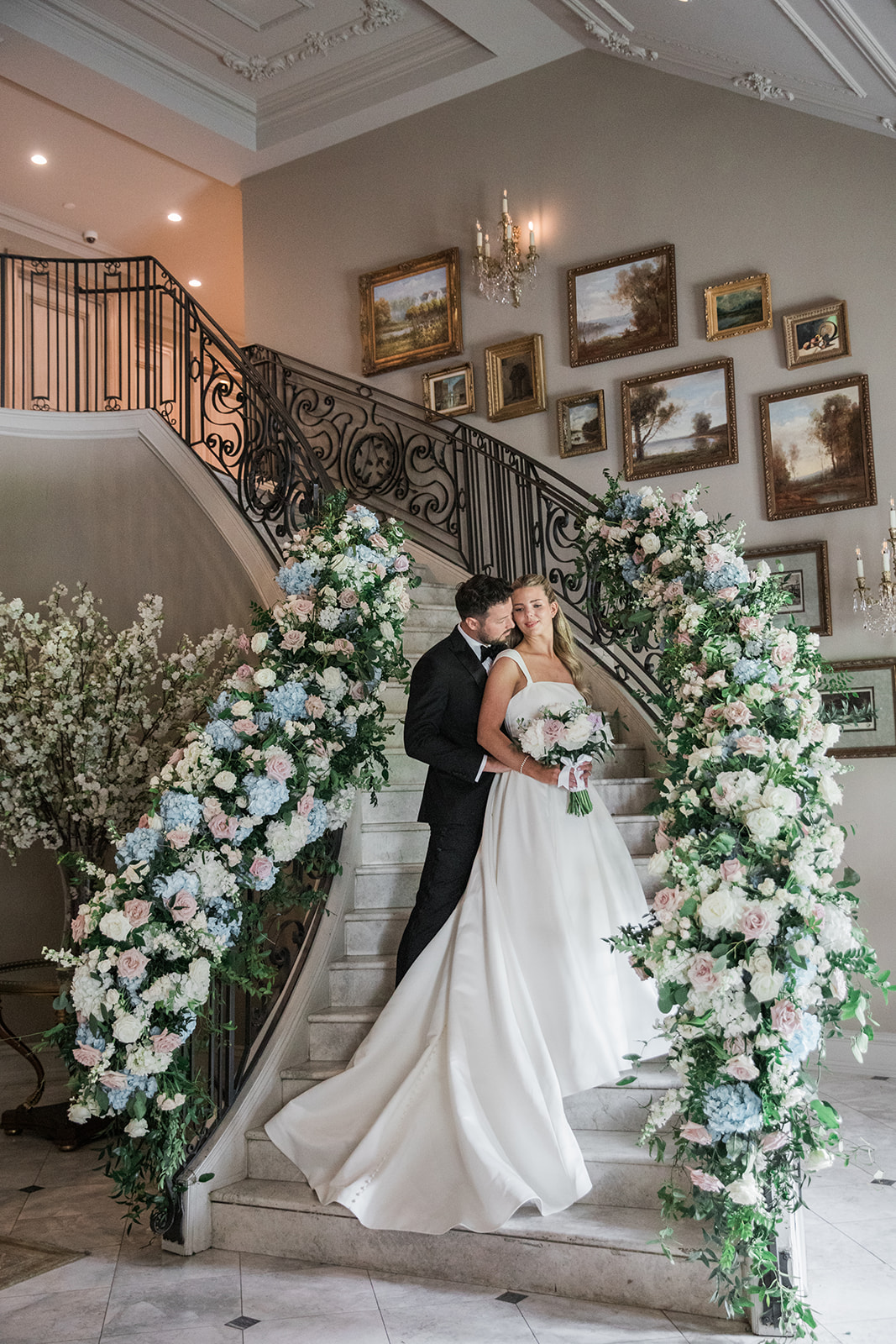 bride and groom on stairs