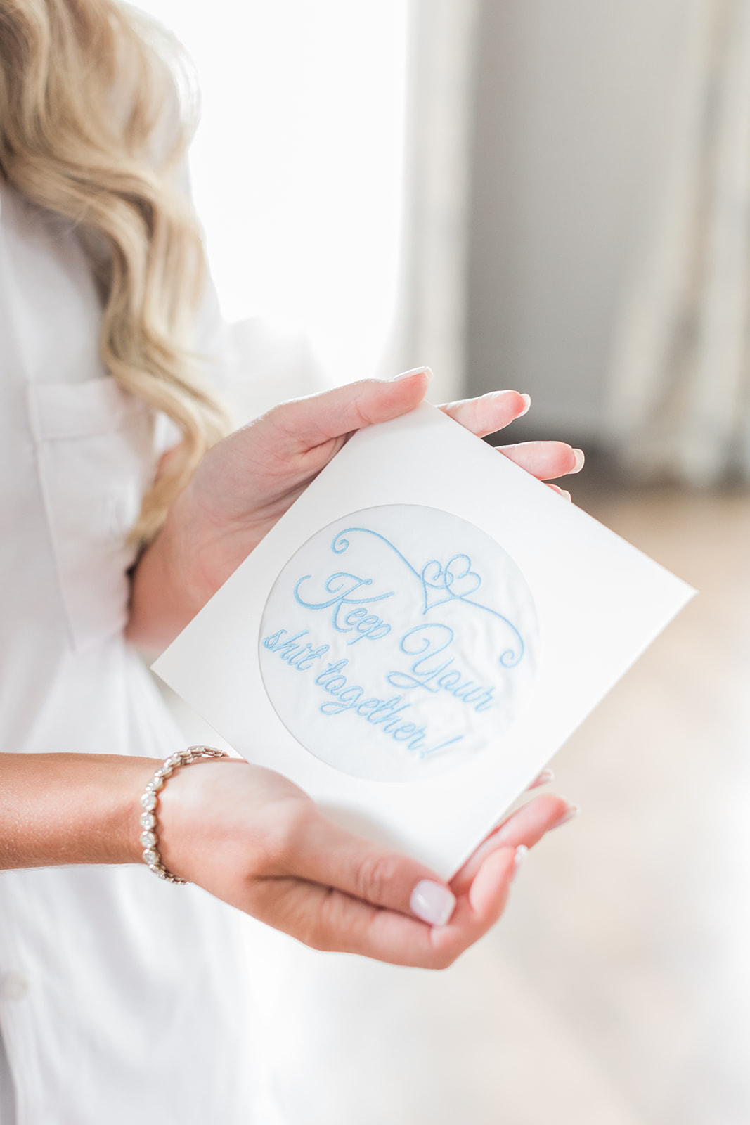 bride holding something blue