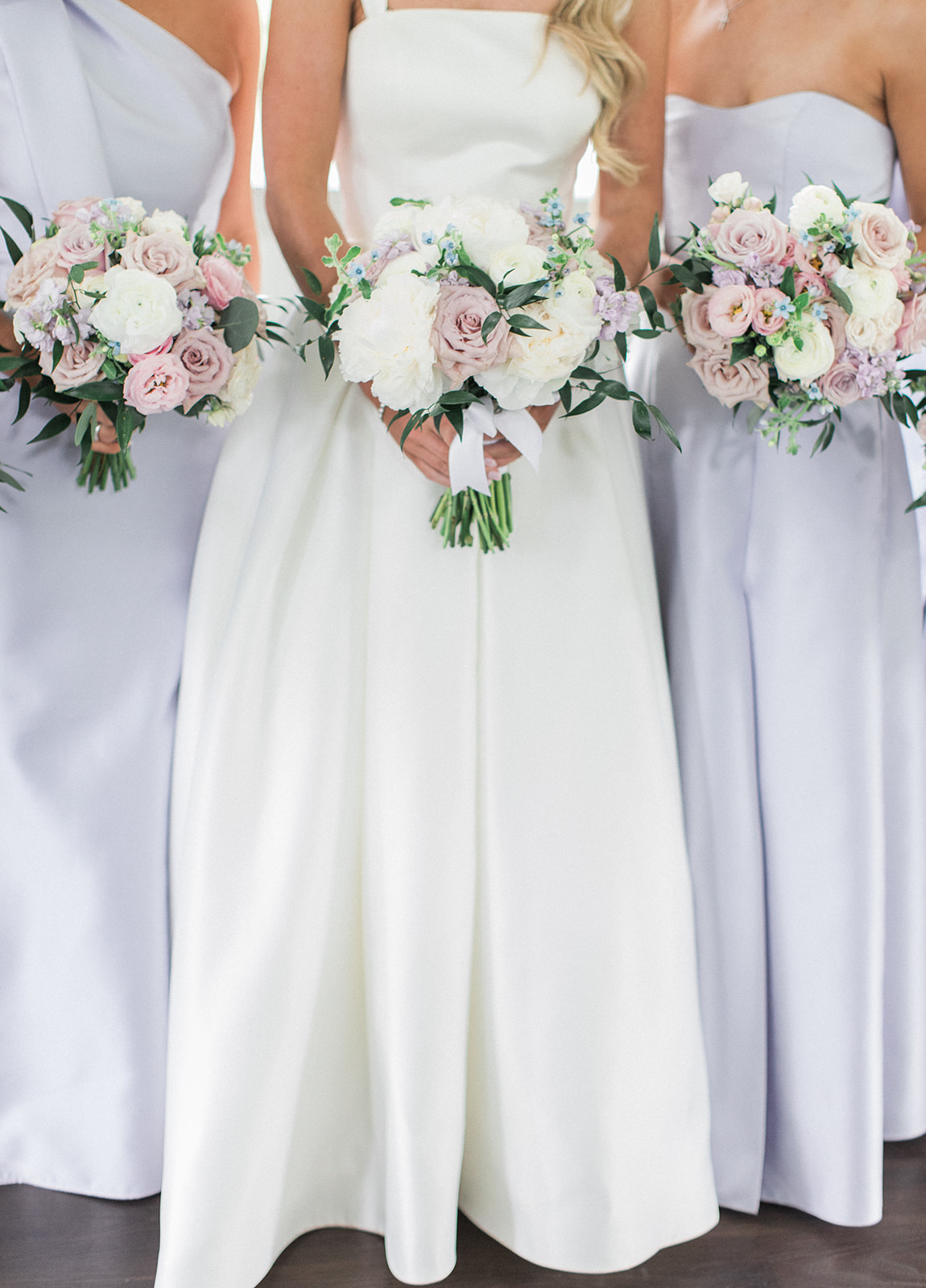 bridal bouquet and two bridesmaid bouquets