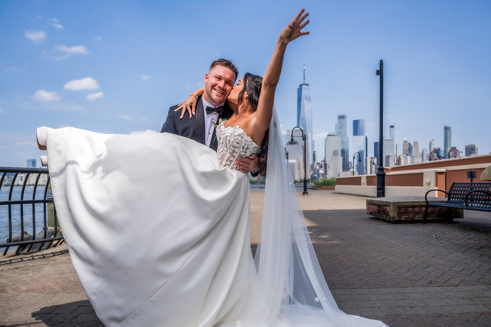 groom lifting bride