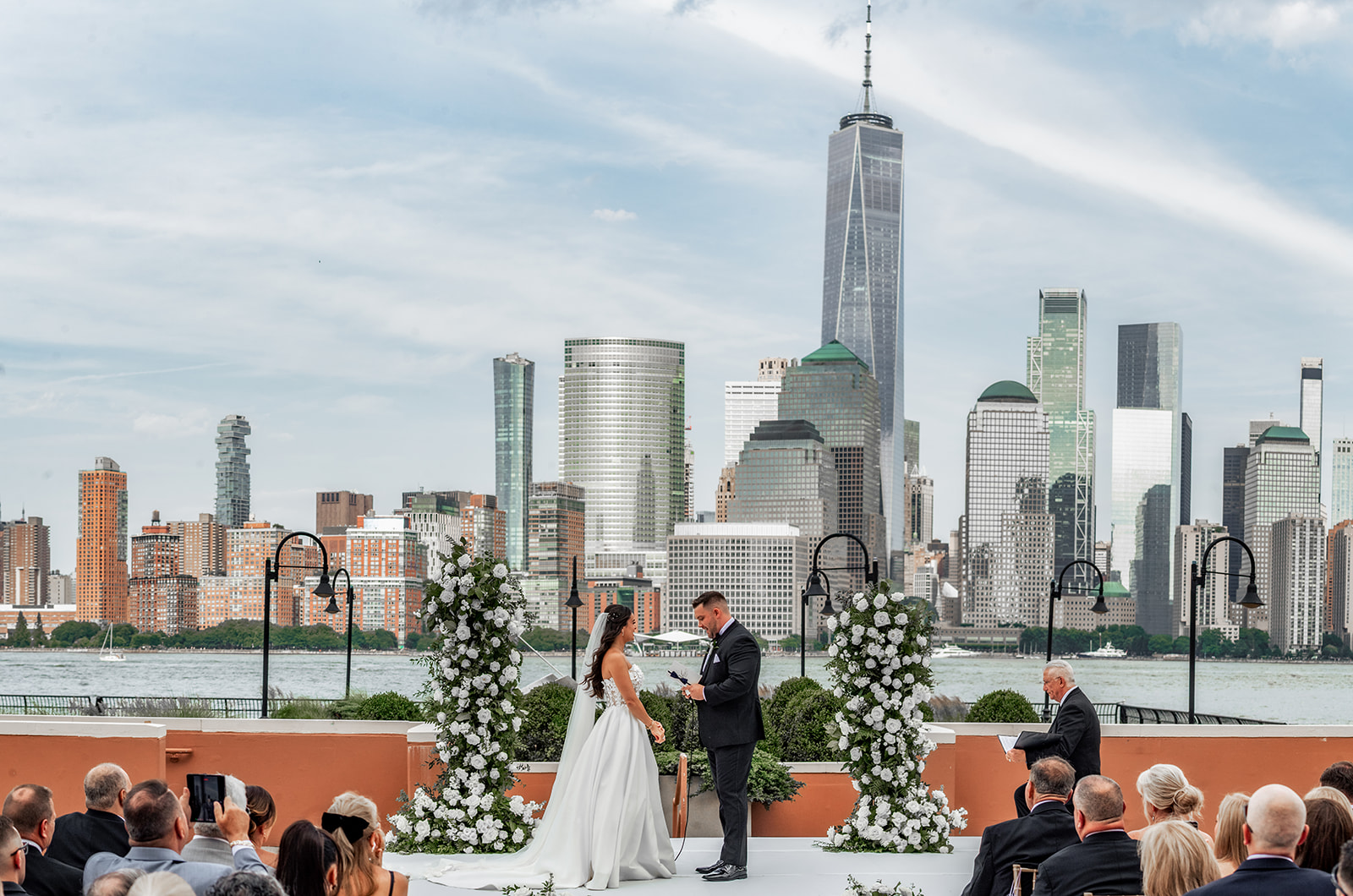 bride and groom ceremony nyc skyline