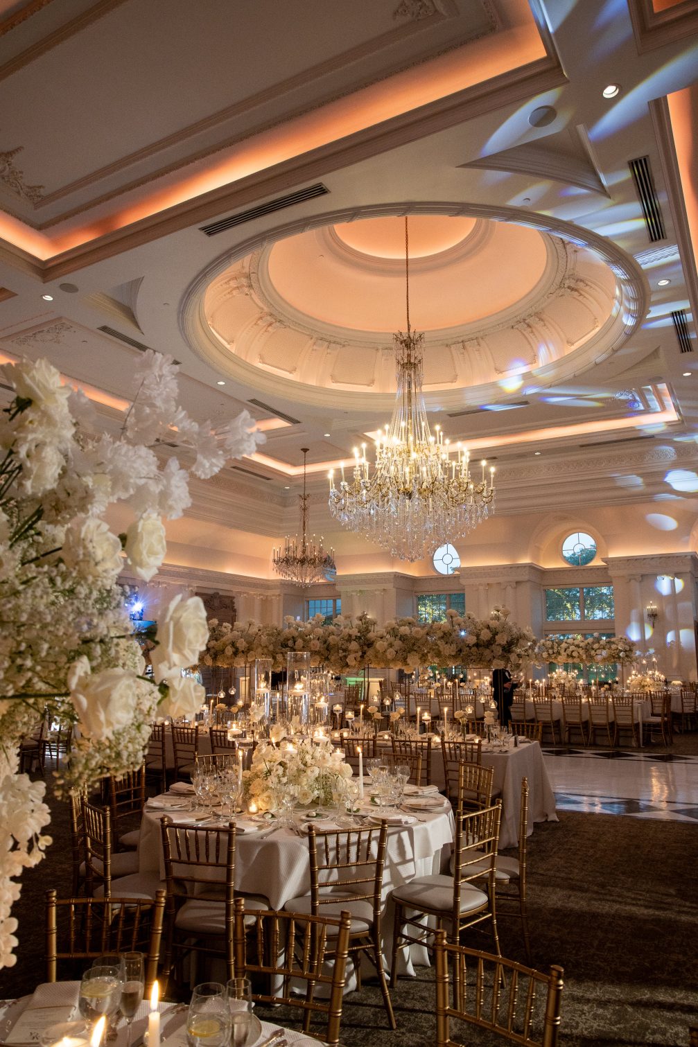 ballroom filled with white flowers