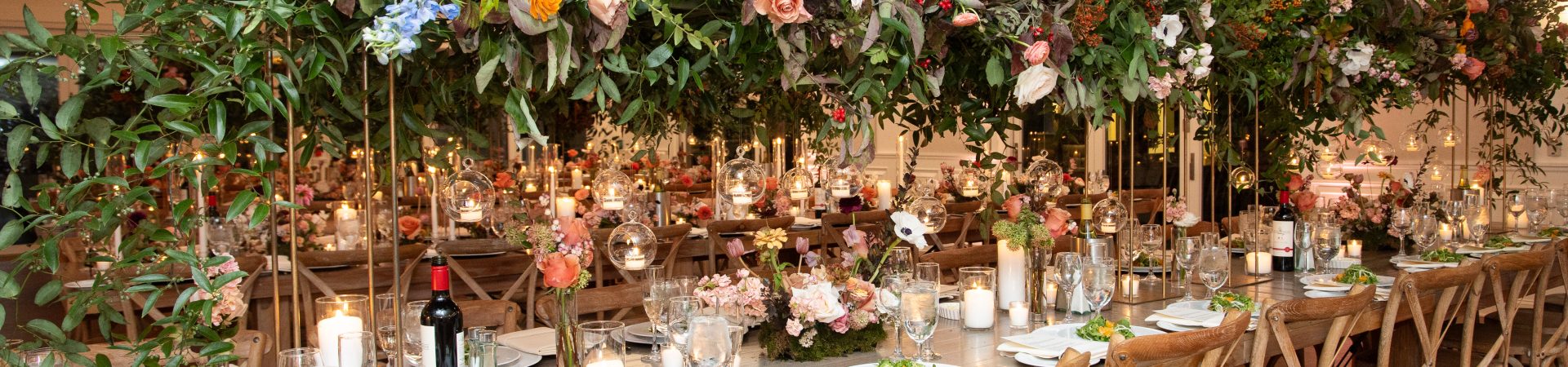 long table with beautiful long floral centerpiece