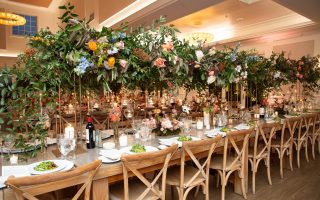 long table with beautiful long floral centerpiece
