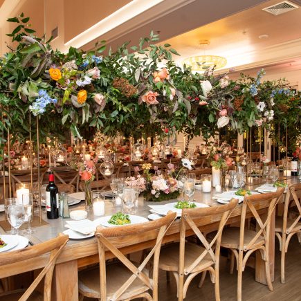 long table with beautiful long floral centerpiece