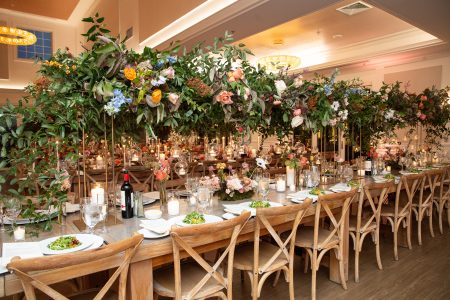long table with beautiful long floral centerpiece