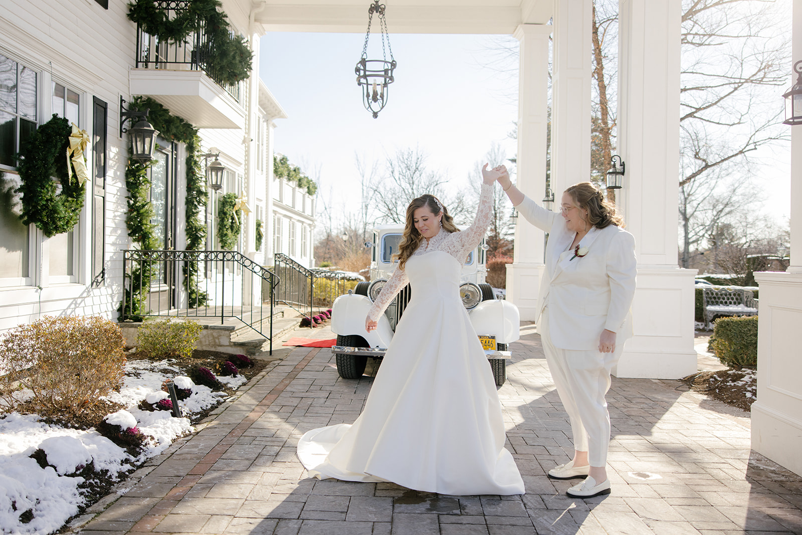 bride and bride dancing during first look