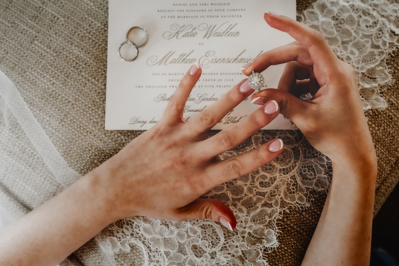 bride putting on ring