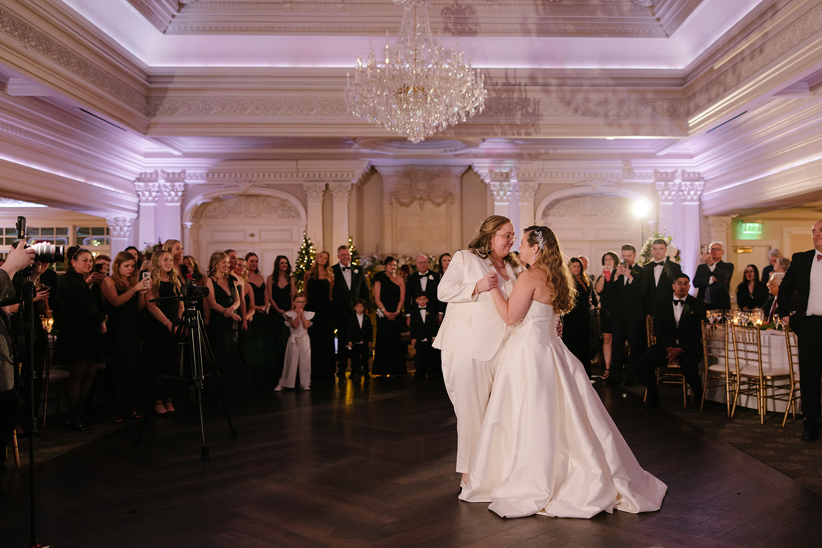 two brides dancing together at their wedding