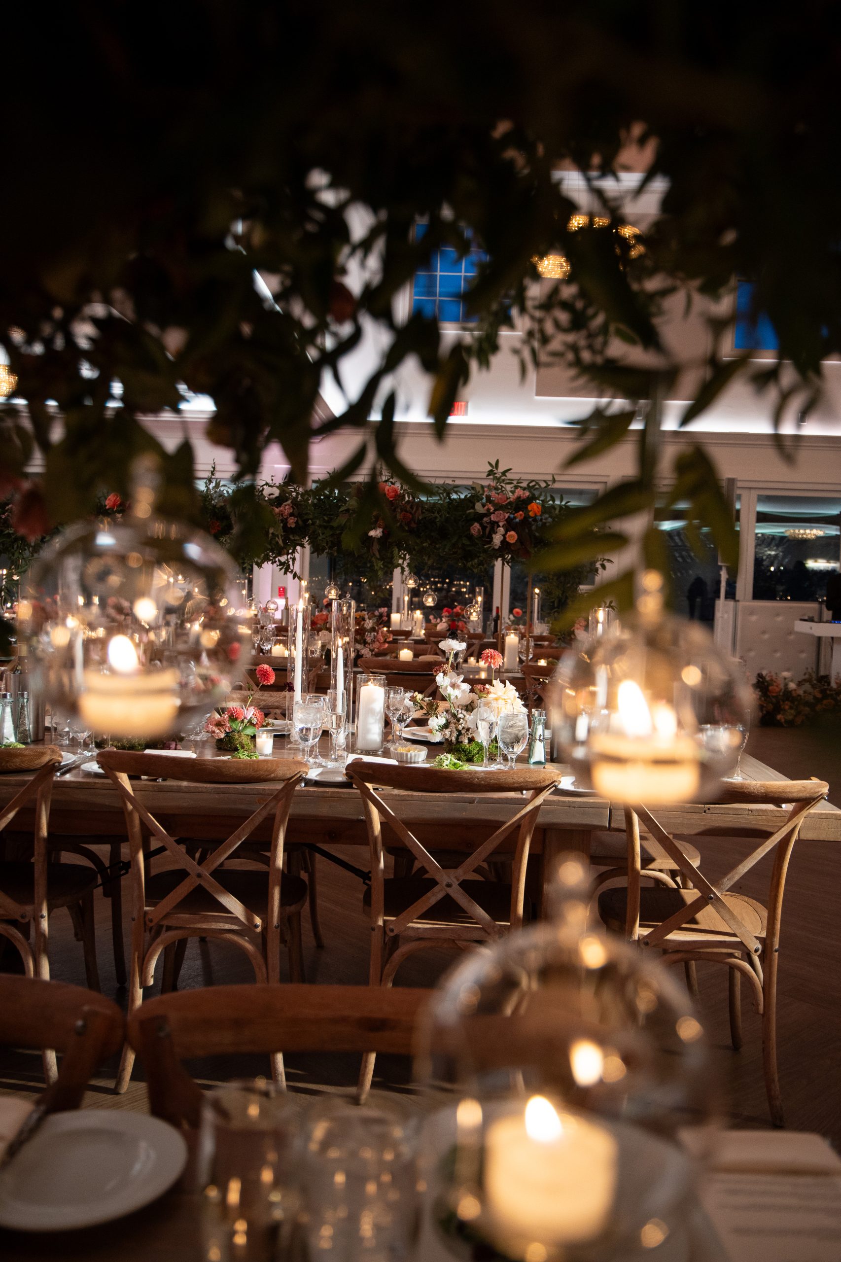 florals dark at wedding reception with candles