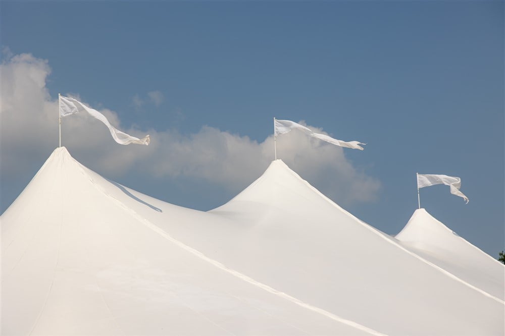 top of a white sail cloth tent